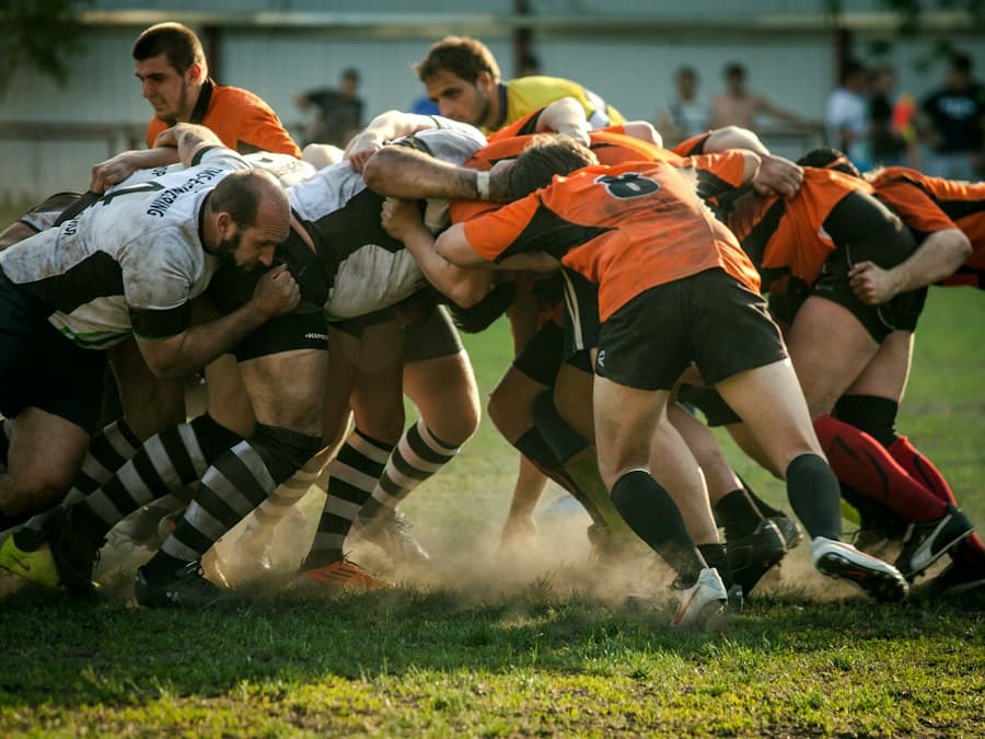 Rugby players packing down in a scrum